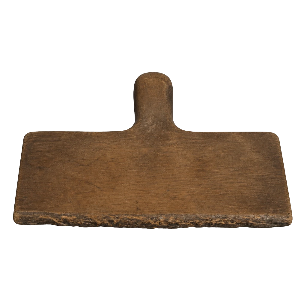 A wooden strickle board used to sweep a bell mould